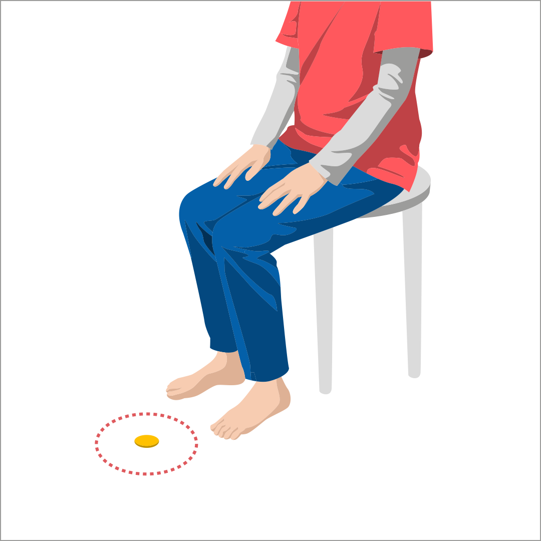 目を閉じたまま、コインの位置に足の指先を合わせる①